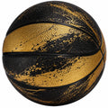 Ballon de basket doré et noir avec design artistique
